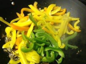 Julienned Bell Peppers added to the pan 