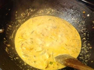Heavy cream added to the bell pepper makhani