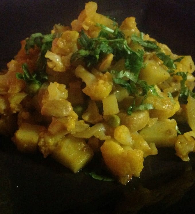 Cauliflower And Potato Curry with Cashews and Tomato Sauce