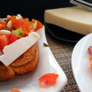 Bruschetta made with different tomato varieties. This Italian staple is very easy to make a favorite among vegetarians