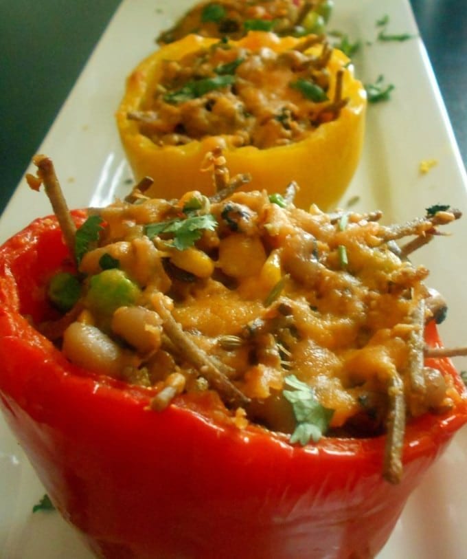 Stuffed Bell Peppers made with soba noodles, peas, corn and cheese.