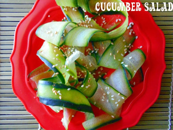 Closeup of strips of cucumber with sesame - Cucumber Salad