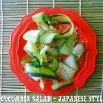 Overhead of strips of cucumber with sesame