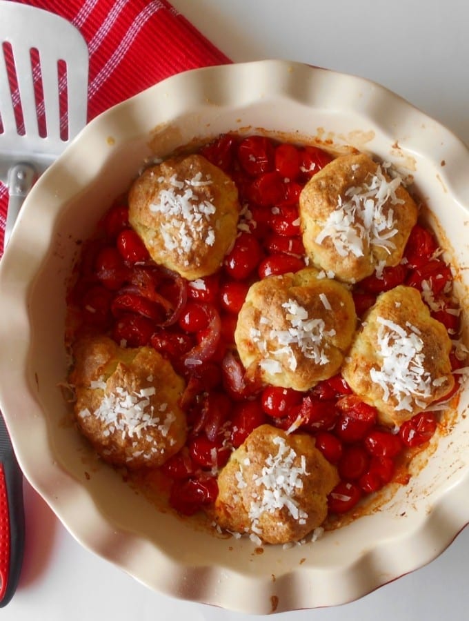 Make this savory Tomato Cobbler and serve it as a side dish to any meal. This classic southern dish is perfect for vegetarians.