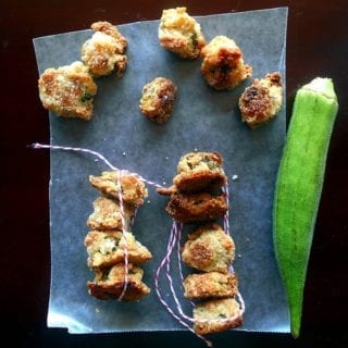 Overhead View of Baked Okra on a Wax Paper. One Green Okra on the Side