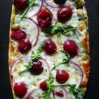 homemade vegan flatbread pizza with cherries