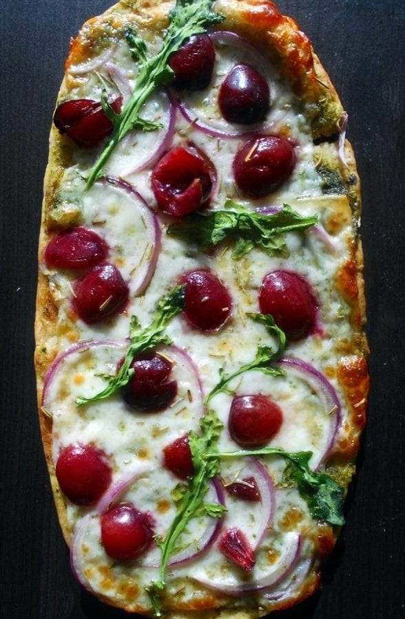 Flatbread Pizza with Cherries and Arugula. Fresh cherry recipes always draws a crowd. This flatbread pizza recipe with delicious melted cheese is perfect comfort food