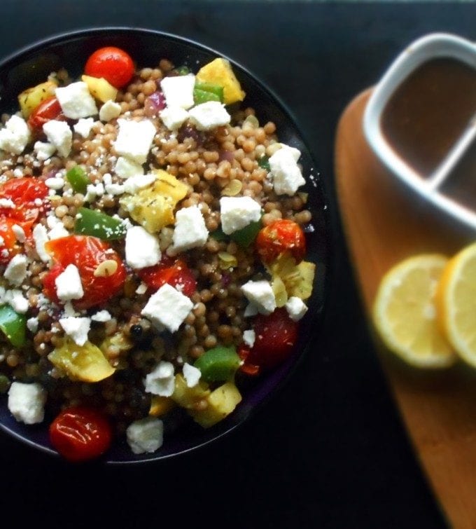 Mediterranean Couscous Salad. Healthy dinner recipe. Made with fresh veggies and light dressing. Couscous recipe that is easy to make. Vegan Greek Recipes