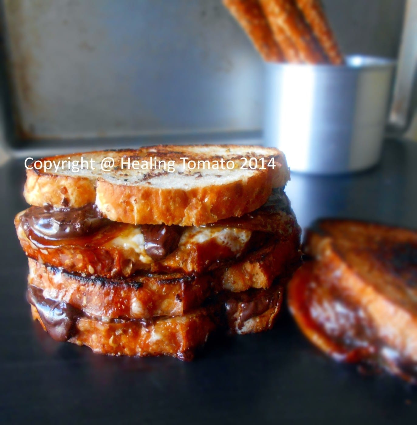 Front view of 2 grilled cheese with chocolate