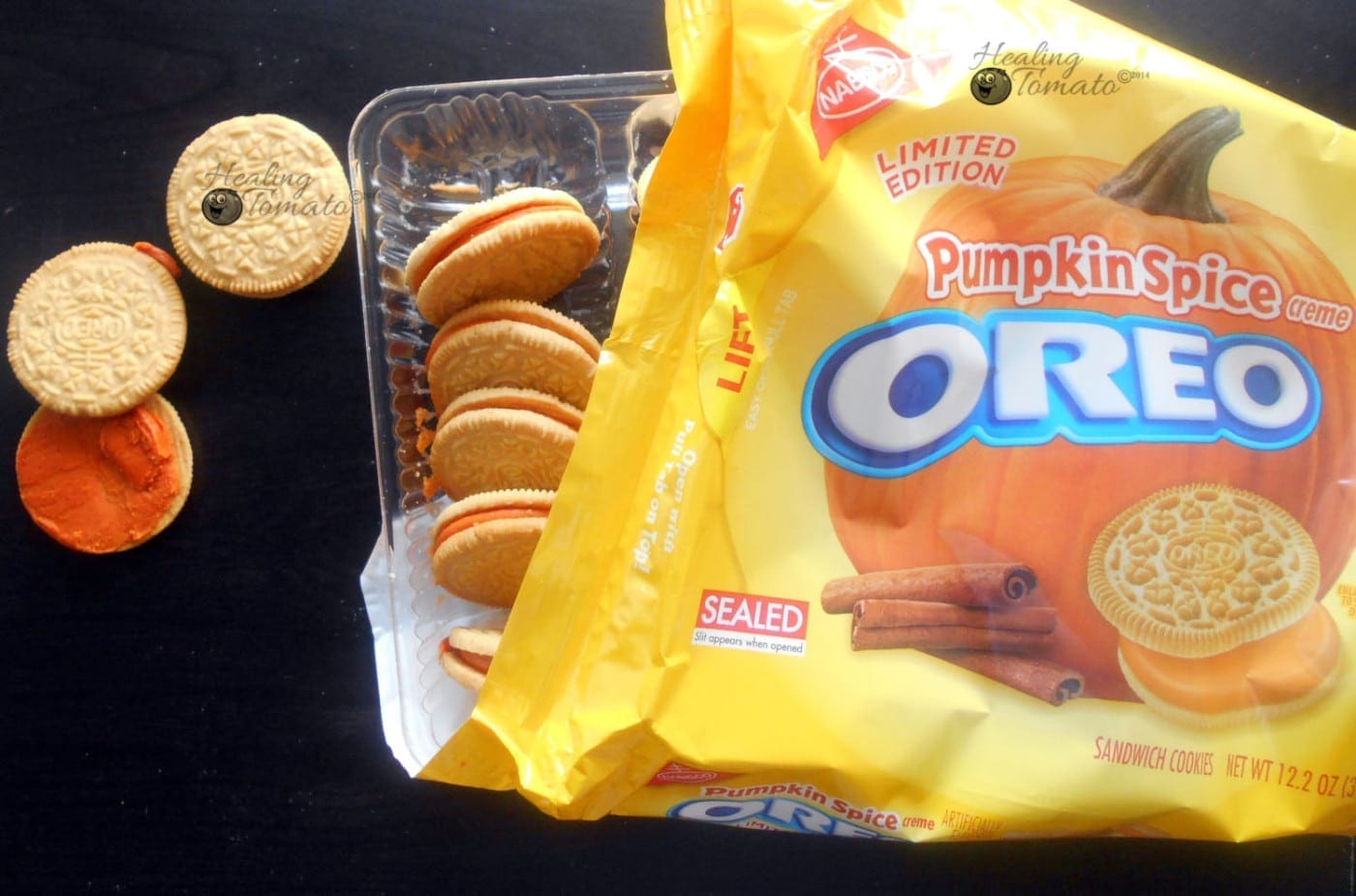 Pumpkin Spice oreos in pacakage with a couple oreos outside and opened