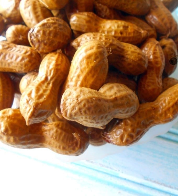 Boiled Peanuts Recipe - perfect healthy snack with holiday flavors. This slow cooked boiled peanuts are a perfect holiday snack idea. Set the cooker in the corner and let your guests eat from eat. Quick snack idea.