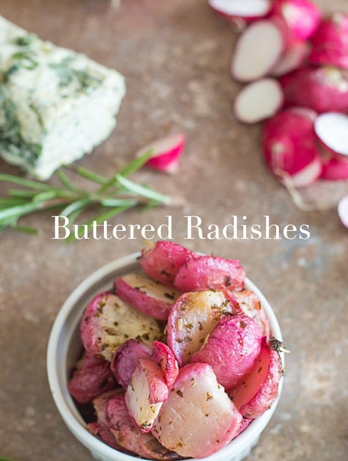 Overhead view of buttered radishes with rosemary on the side and vegan infused butter on the left