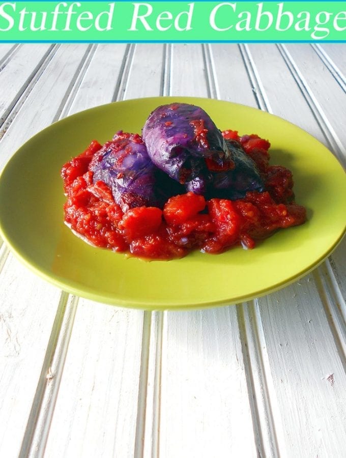 Vegan Stuffed Cabbage - A delicious twist on the traditional St. Patrick's Day Recipe. The stuffing is made using brown rice, mini sweet peppres, zucchini, peas, okra, Shiitake mushrooms and brown rice