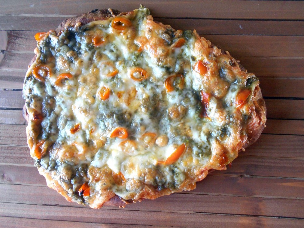 Overhead and closeup view of flatbread pizza