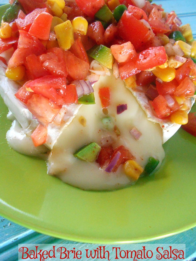 Baked brie with tomato salsa is a great way to spice up chips and dip. It is very easy to make. This is a quick dip recipe and goes great on Cinco De Mayo