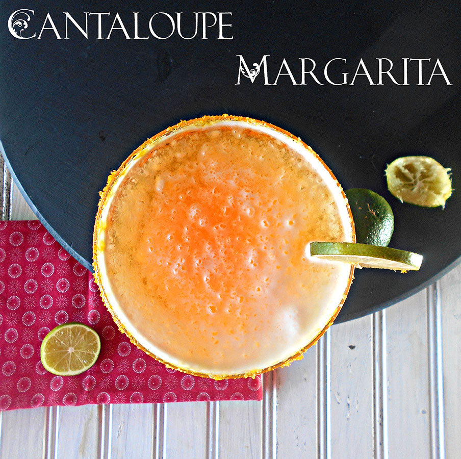 Overhead view of a margarita glass filled with Cantaloupe Margarita and a garnish of lime. 
