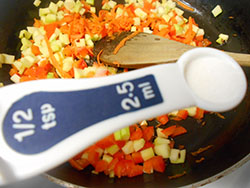 Salt added to a stir fry pan - Vegan Meatloaf recipe