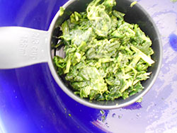 Spinach added to a stir fry pan - Vegan Meatloaf recipe