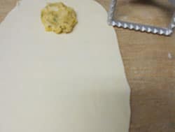 One of the traced ravioli has a ball of the carnival stuffing put in the middle 