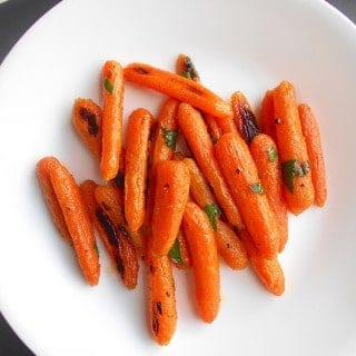 Vegan Glazed Carrots With Cilantro on a White Dish