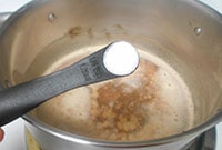 Sugar being added to the pan - Boozy Hot Chocolate