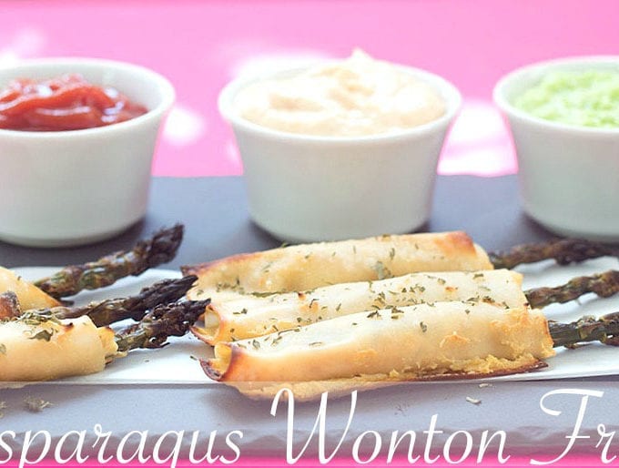Asparagus Wonton Fries - easy to make + healthy baked. Spread Mango sriracha dip on the wontons, wrap it and roast. Simple, kid-friendly vegan snack
