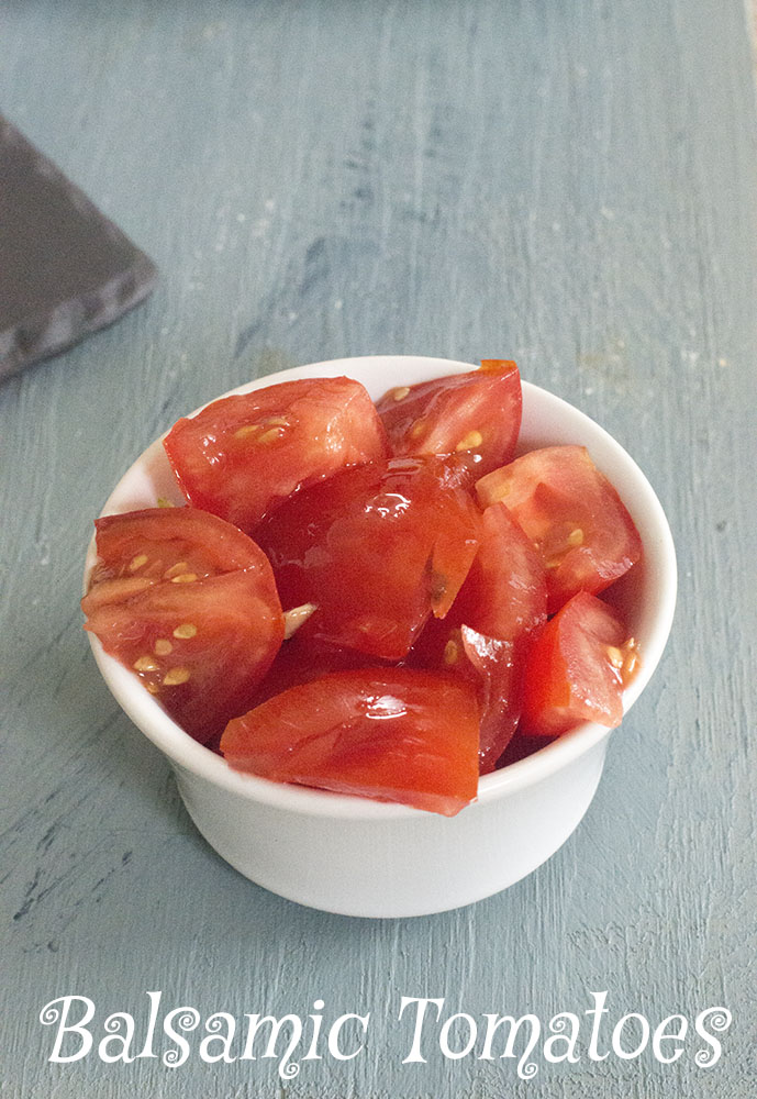 A ramekin with chopped plum tomatoes sauted in balsamic sauce - Vegan tapas
