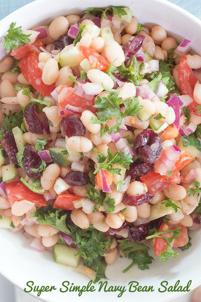 Vegan Navy Beans Salad Recipe made in minutes. No cooking required! #healingtomato #vegan #sides #thanksgivingsides #healthy #recipes #cranberry If you are looking for vegan Thanksgiving sides and vegetarian thanksgiving sides, this is THE salad you need to make. #navybeans #familymeals #food #salad #nocooking https://www.healingtomato.com/navy-beans-salad/