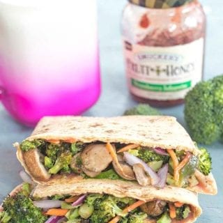 Sweet & spicy veggie flatbread sandwich that is great for any brown bag lunch idea. The base is made with Tofu + Smucker’s Strawberry Jalapeno Fruit & Honey