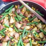 Simple green beans and potatoes recipe made with simple spices. Side dish or perfect lunch meal for vegans, vegetarians and omnivores. Takes 30 min or less