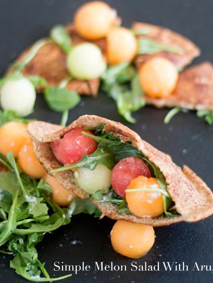 A simple melon and arugula salad with a vegan yogurt dressing. Served on a bed of pita chips or serve in a cinnamon sugar pita pocket. Easy Lunch recipe