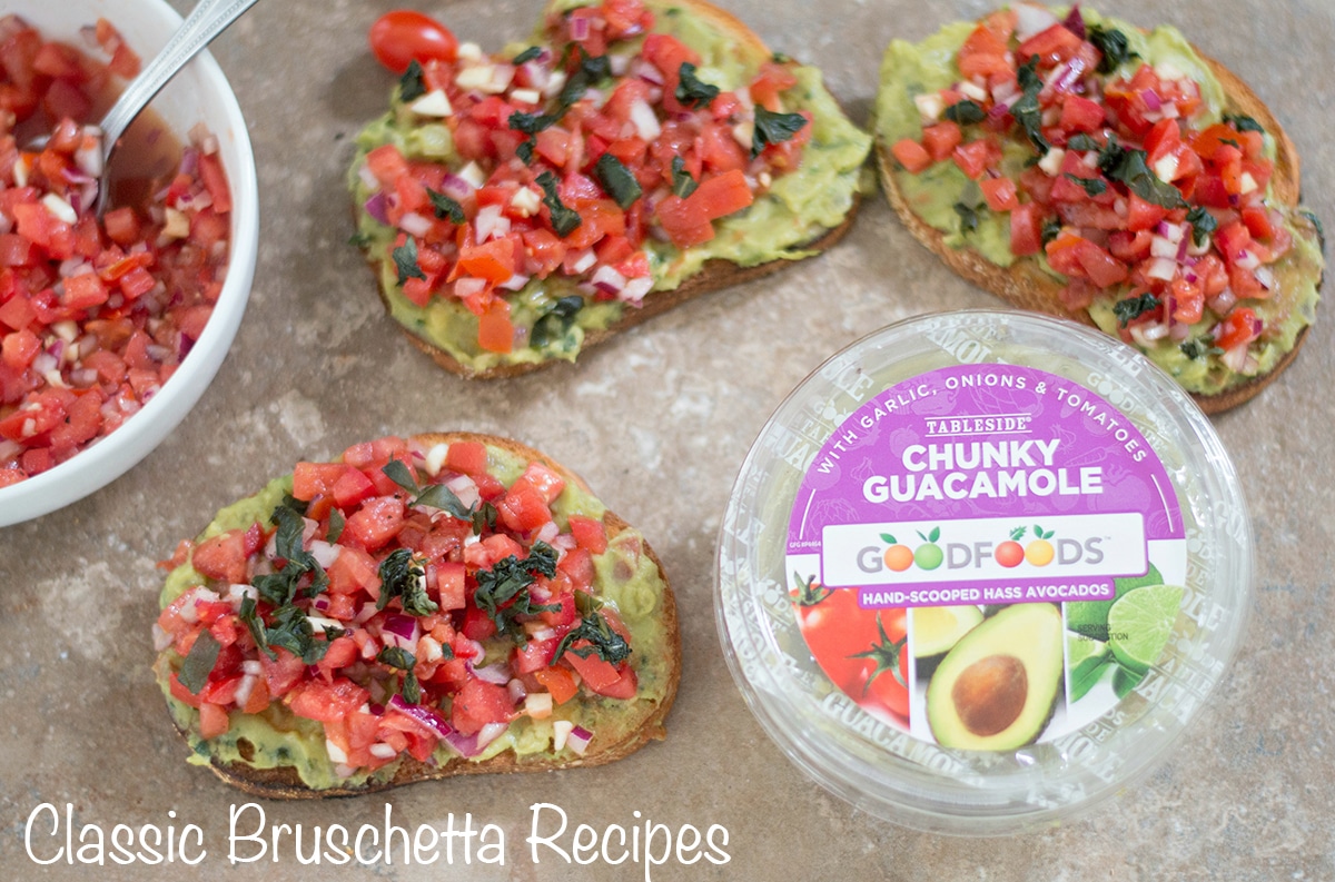 Overhead view of 3 bruschetta gaucamole, a white bowl with bruschetta and one container of chunky guacamole