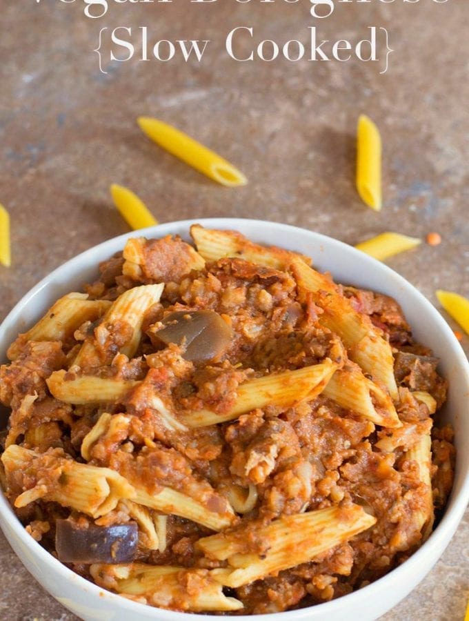 Simple slow cooker vegan bolognese recipe using fresh veggies and red lentils. Serve with spaghetti or penne pasta. Make for a weeknight family dinner
