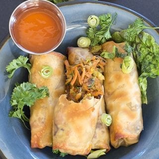 Baked vegan spring rolls made with Brussels sprouts and sweet potatoes. Quick and easy lunch recipe is a twist on the traditional Chinese recipe staple.