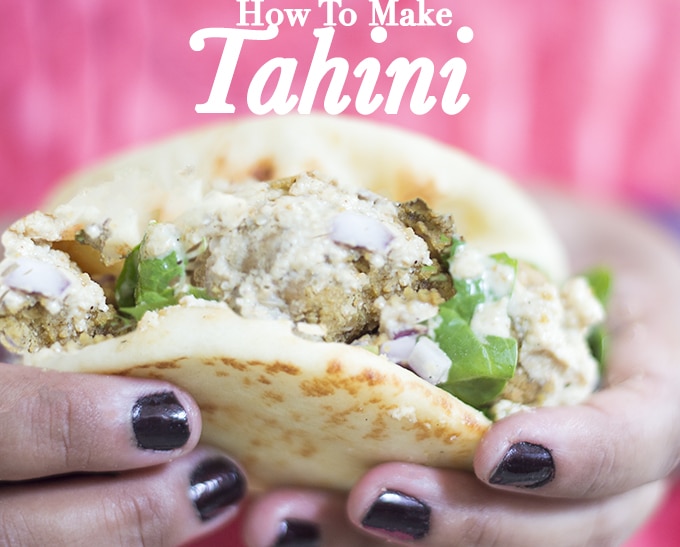 Front View of a Falafel Pita Sandwich Held by the Author