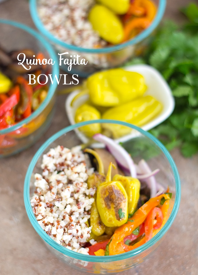 Quick and easy Vegan Quinoa Fajita Bowls with fresh bell peppers. Make this simple recipe and put it in meal prep containers to enjoy it all week. #mealprep #healthy #comfortfood #vegan #vegetarian #quinoa #fajita #mexican Overhead View of a Small Glass Bowl Filled With Quinoa on the Left. On the Right, There are Cooked Red Bell Peppers, Mushrooms, Peperoncini, Red Onions. 2 Other Bowls Filled Similarly are Partially Visible on the Left and Top of the Main Bowl. In the Space Between the 3 Bowls, A Small White Bowl Filled with Peperoncini is Sitting on Top A Bunch of Cilantro