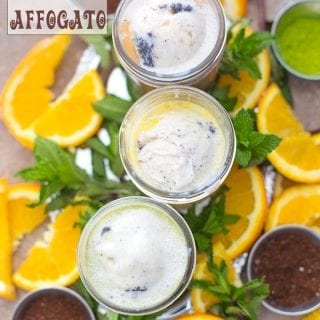 Overhead view of 3 Mason Jars filled with 3 different types of affogato and surrounded by orange slices, coffee, matcha powder and mint leaves