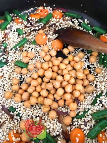 Chick Peas added to the pan