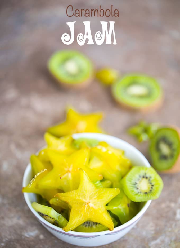 Front View of Cut Star Fruit Carambola in a White Bowl with Cut Kiwi