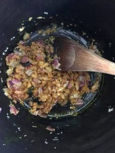 onions and spices stirred
