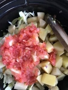 plum tomatoes shredded finely and added to slow cooker - Cabbage Curry