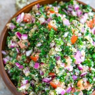 Overhead view of a brown bowl filled to the top with Amaranth Tabouli