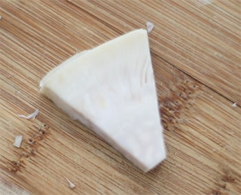 A triangle shaped jackfruit piece taken from a can - Jackfruit Chowder