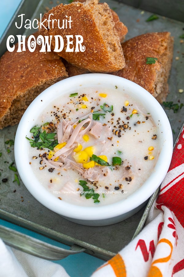 Jackfruit chowder in a white bowl and grey tray