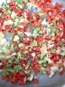 celery, red bell peppers and onions in pan - how to make creamed corn