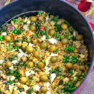 Overhead view of vegan paella made with quinoa in a Dutch oven