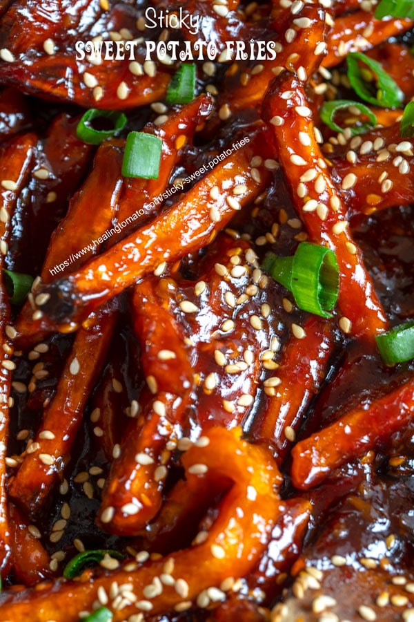 Closeup of sticky sweet potato fries in a wok