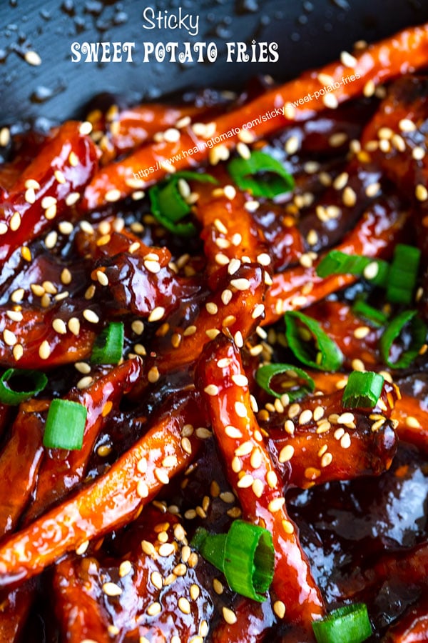 Closeup of sticky sweet potato fries in a wok