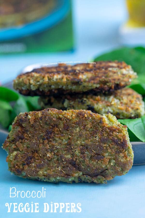 Front view of broccoli dippers on a bed of greens