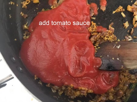 tomato sauce added to pan